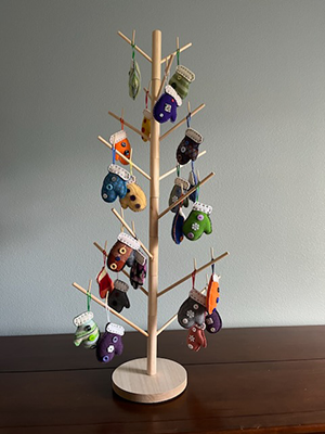Tree with mitten ornaments
